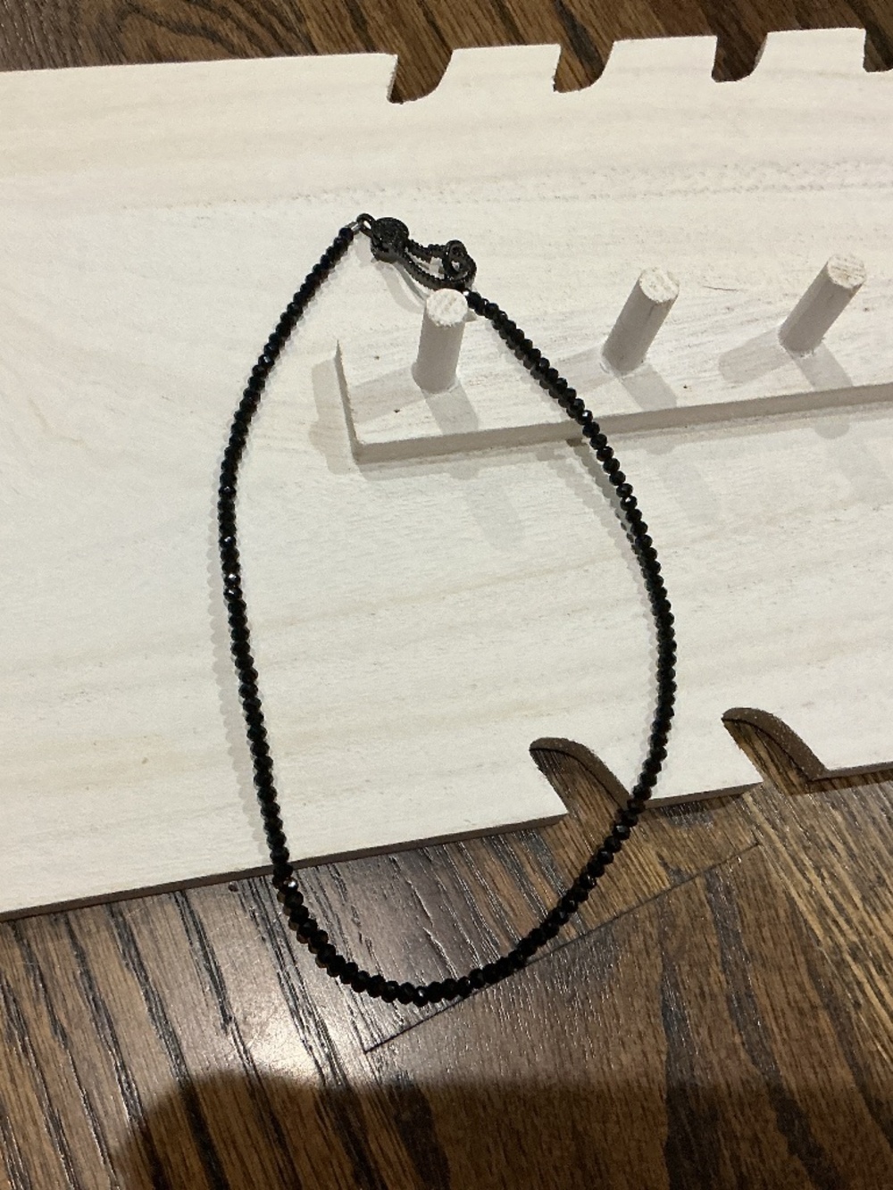 A shiny classic black necklace